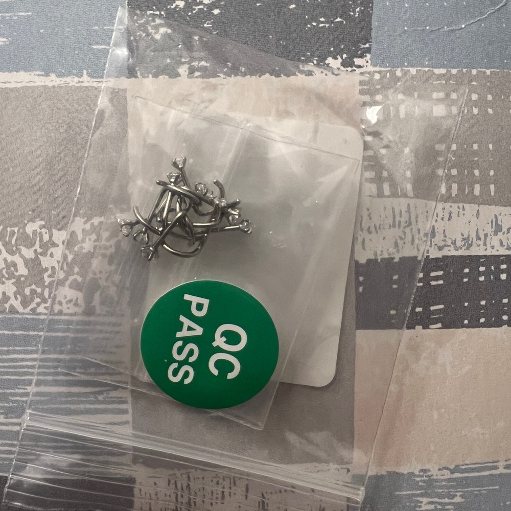 10 piece corkscrew nose ring studs.